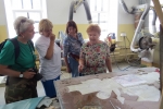 увеличить
